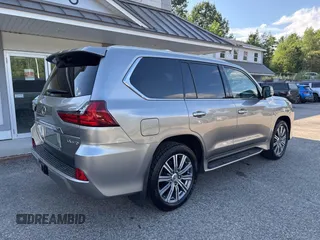 2016 Lexus LX 570 with VIN JTJHY7AX4G4198811, listed as a IAAI auction lot 42702619 with 107,759 mi miles and . Bid and sale history available at DreamBid. Image 4.