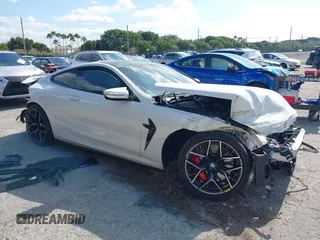 2022 BMW M8 Competition with VIN WBSAE0C02NCH10522, listed as a IAAI auction lot 41321013 with 44,389 mi miles. Bid and sale history available at carsss.com. Image 1.