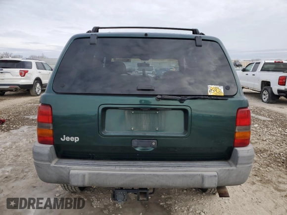1998 Jeep Grand Cherokee Laredo with VIN 1J4GZ58S5WC285562, listed as a Copart auction lot 89204135 with 0 mi miles and Salvage Title. Bid and sale history available at carsss.com. Image 6.