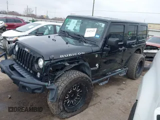 2017 Jeep Wrangler Unlimited Rubicon Recon z VIN 1C4HJWFG9HL592824, wystawiony jako IAAI lot #41427433 z przebiegiem 70 105 mil mil oraz . Historia ofert i sprzedaży dostępna na DreamBid. Obrazek 2.
