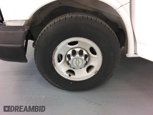 2013 Chevrolet Express Cargo with VIN 1GCWGFBA5D1138521, listed as a IAAI auction lot 42785471 with 157,254 mi miles and . Bid and sale history available at DreamBid. Image 20.