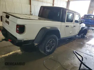 2021 Jeep Gladiator Rubicon с VIN 1C6JJTBG8ML527146, выставлен на аукционе Copart как лот 55036755 с пробегом 77 695 миль миль и Списание • Salvage title. История ставок и продаж доступна на DreamBid. Изображение 3.