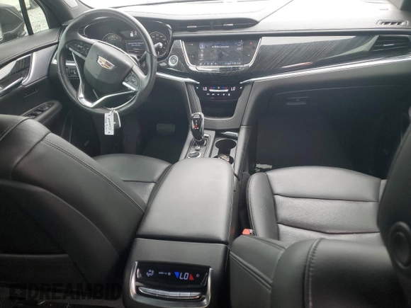 2020 Cadillac XT6 FWD Premium Luxury with VIN 1GYKPCRS4LZ133123, listed as a Copart auction lot 59411115 with 64,463 mi miles and Salvage title. Bid and sale history available at DreamBid. Image 8.