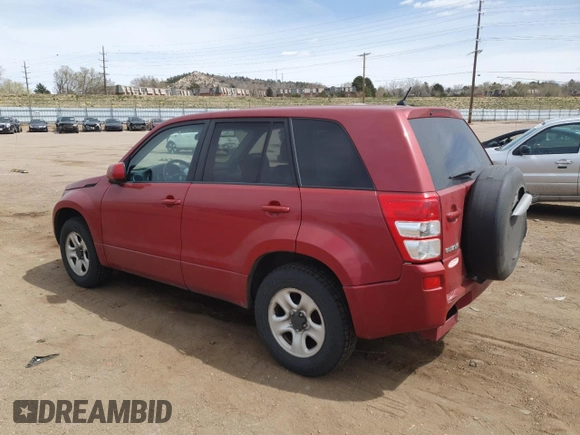 2012 Suzuki Grand Vitara Premium z VIN JS3TD0D20C4101342, wystawiony jako Copart lot #51956595 z przebiegiem 166 710 mil mil oraz Szkody całkowita. Historia ofert i sprzedaży dostępna na DreamBid. Obrazek 2.