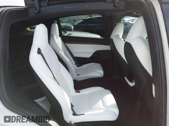 2023 Tesla Model X with VIN 7SAXCBE54PF384403, listed as a IAAI auction lot 40947187 with 16,881 mi miles and . Bid and sale history available at DreamBid. Image 8.