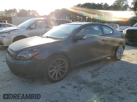 2005 Scion tC with VIN JTKDE177850037762, listed as a Copart auction lot 86132014 with 165,009 mi miles and Salvage Title. Bid and sale history available at carsss.com. Image 1.