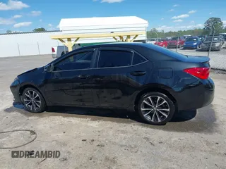 2019 Toyota Corolla L z VIN 5YFBURHE2KP897493, wystawiony jako IAAI lot #42052106 z przebiegiem 100 303 mil mil oraz . Historia ofert i sprzedaży dostępna na DreamBid. Obrazek 14.