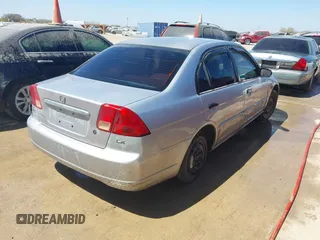 2001 Honda Civic LX with VIN 1HGES15541L052405, listed as a IAAI auction lot 41688521 with 258,315 mi miles. Bid and sale history available at carsss.com. Image 4.