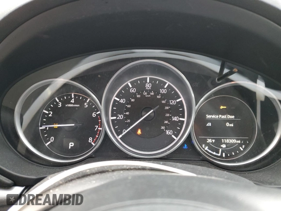 2018 Mazda CX-5 Touring z VIN JM3KFACM9J0300642, wystawiony jako Copart lot #80210854 z przebiegiem 118 309 mil mil oraz Szkoda całkowita • Salvage title. Historia ofert i sprzedaży dostępna na DreamBid. Obrazek 9.
