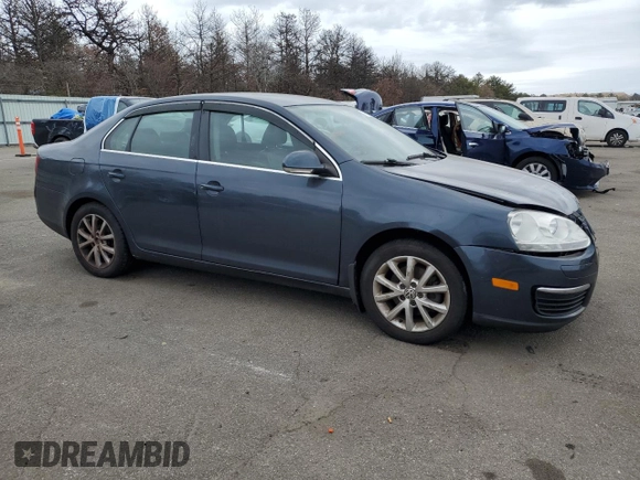 2010 Volkswagen Jetta SE with VIN 3VWRZ7AJ2AM038256, listed as a Copart auction lot 47631015 with 205,579 mi miles and Salvage title. Bid and sale history available at DreamBid. Image 4.