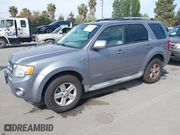 2008 Ford Escape Hybrid with VIN 1FMCU49H78KE79028, listed as a IAAI auction lot 42142396 with 131,642 mi miles and . Bid and sale history available at DreamBid. Image 2.