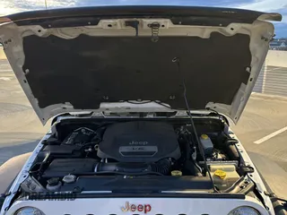 2018 Jeep Wrangler JK Unlimited Sport S with VIN 1C4BJWDG3JL805961, listed as a Copart auction lot 42876675 with 58,839 mi miles and Salvage Title. Bid and sale history available at carsss.com. Image 7.