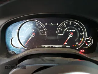 2020 BMW X3 M Competition z VIN 5YMTS0C00L9B62546, wystawiony jako Copart lot #75320463 z przebiegiem 28 111 mil mil oraz . Historia ofert i sprzedaży dostępna na DreamBid. Obrazek 9.