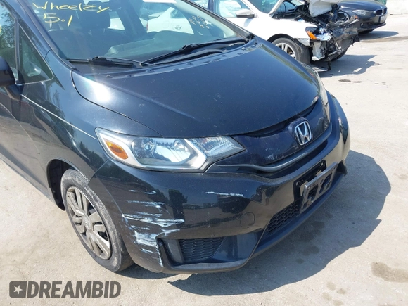 2015 Honda Fit LX z VIN 3HGGK5H51FM724566, wystawiony jako IAAI lot #42151755 z przebiegiem 168 744 mil mil oraz . Historia ofert i sprzedaży dostępna na DreamBid. Obrazek 6.