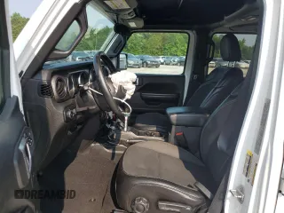 2020 Jeep Wrangler Unlimited Freedom with VIN 1C4HJXDG9LW238432, listed as a Copart auction lot 59087435 with 92,093 mi miles and Salvage title. Bid and sale history available at DreamBid. Image 7.