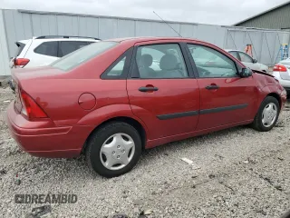 2003 Ford Focus LX with VIN 1FAFP33P13W228550, listed as a Copart auction lot 84184084 with 128,196 mi miles and Non Repairable. Bid and sale history available at DreamBid. Image 3.