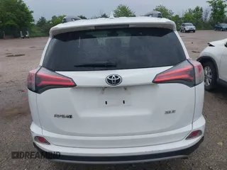 2018 Toyota RAV4 XLE with VIN 2T3WFREV4JW469929, listed as a IAAI auction lot 42536958 with 82,443 mi miles and . Bid and sale history available at DreamBid. Image 16.