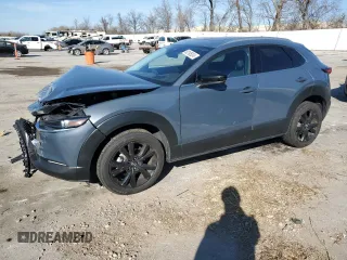 2021 Mazda CX-30 Premium with VIN 3MVDMBDY6MM300242, listed as a Copart auction lot 82195024 with 34,500 mi miles and Salvage Title. Bid and sale history available at carsss.com. Image 1.