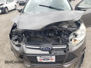 2013 Ford Focus SE with VIN 1FADP3F21DL320932, listed as a Copart auction lot 55031435 with 133,444 mi miles and Salvage title. Bid and sale history available at DreamBid. Image 12.