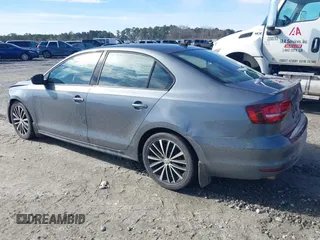 2016 Volkswagen Jetta Sport z VIN 3VWD17AJXGM302382, wystawiony jako IAAI lot #41441854 z przebiegiem 131 569 mil mil oraz . Historia ofert i sprzedaży dostępna na DreamBid. Obrazek 3.