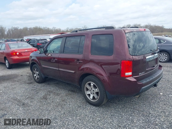 2010 Honda Pilot Touring with VIN 5FNYF4H95AB040721, listed as a IAAI auction lot 41928412 with 213,219 mi miles and . Bid and sale history available at carsss.com. Image 3.