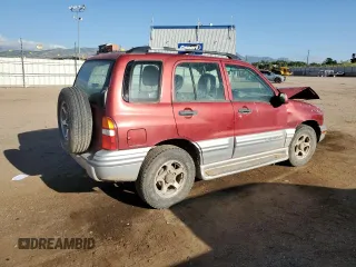 2001 Chevrolet Tracker LT z VIN 2CNBJ634716945832, wystawiony jako Copart lot #61967345 z przebiegiem 136 403 mil mil oraz Szkoda całkowita • Salvage title. Historia ofert i sprzedaży dostępna na DreamBid. Obrazek 3.
