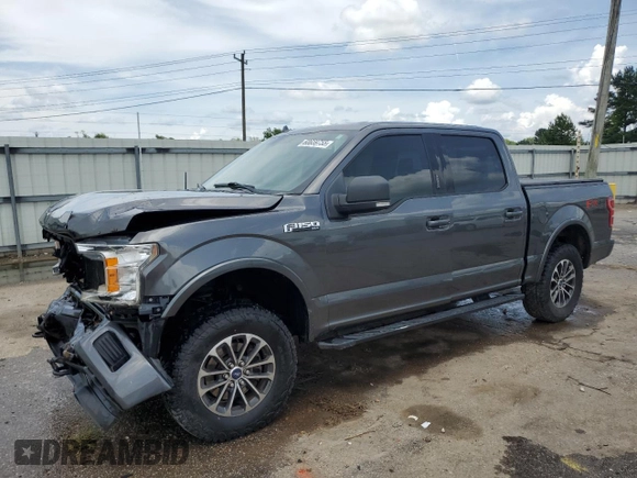 2018 Ford F-150 XL with VIN 1FTEW1EG7JFC40015, listed as a Copart auction lot 60659755 with 194,645 mi miles and Salvage title. Bid and sale history available at DreamBid. Image 1.