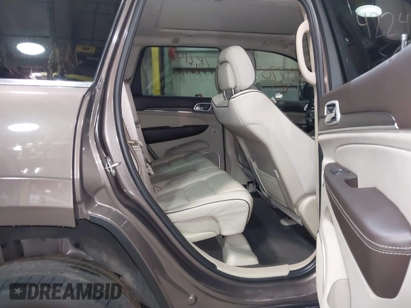 2020 Jeep Grand Cherokee Summit with VIN 1C4RJFJG1LC170714, listed as a IAAI auction lot 42247702 with 78,614 mi miles and . Bid and sale history available at DreamBid. Image 8.