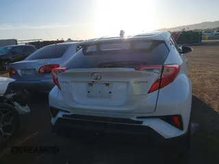 2021 Toyota C-HR LE with VIN JTNKHMBX3M1114590, listed as a IAAI auction lot 41560459 with 61,803 mi miles. Bid and sale history available at carsss.com. Image 16.