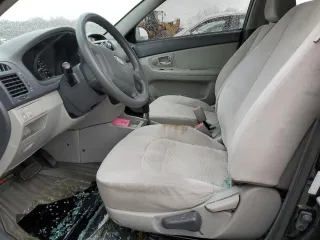 2009 Kia Spectra EX with VIN KNAFE222795620282, listed as a Copart auction lot 53187425 with 0 mi miles and Salvage Title. Bid and sale history available at carsss.com. Image 7.