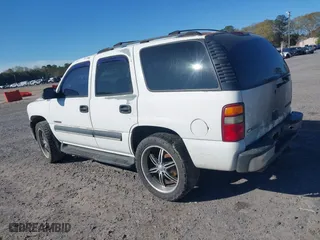 2003 Chevrolet Tahoe LS with VIN 1GNEC13V23J329623, listed as a IAAI auction lot 41885652 with 277,112 mi miles. Bid and sale history available at carsss.com. Image 3.