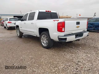 2018 Chevrolet Silverado 1500 High Country with VIN 3GCUKTEC1JG331991, listed as a IAAI auction lot 41718084 with 120,924 mi miles and . Bid and sale history available at DreamBid. Image 3.