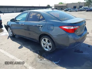 2014 Toyota Corolla L with VIN 5YFBURHE5EP005970, listed as a IAAI auction lot 42131661 with 115,840 mi miles and . Bid and sale history available at DreamBid. Image 3.