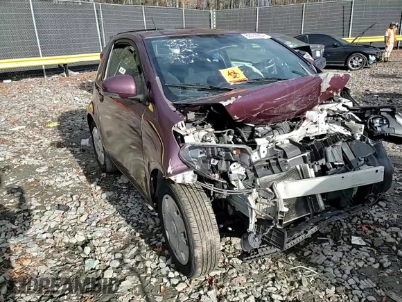 2013 Scion iQ with VIN JTNJJXB00DJ022017, listed as a Copart auction lot 82717994 with Not provided miles and Salvage title. Bid and sale history available at DreamBid. Image 10.