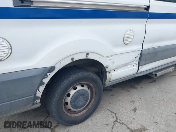 2016 Ford Transit Cargo z VIN 1FTBW2CM4GKA02611, wystawiony jako IAAI lot #41845080 z przebiegiem 175 109 mil mil oraz . Historia ofert i sprzedaży dostępna na DreamBid. Obrazek 16.