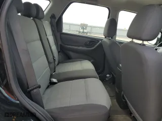 2007 Ford Escape XLS with VIN 1FMYU02Z97KB08307, listed as a Copart auction lot 87320234 with 121,746 mi miles and Salvage Title. Bid and sale history available at carsss.com. Image 11.