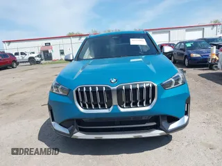 2023 BMW X1 xDrive28i with VIN WBX73EF00P5W52935, listed as a IAAI auction lot 42221084 with 16,394 mi miles and . Bid and sale history available at DreamBid. Image 12.