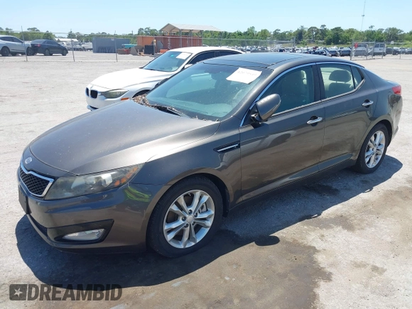 2012 Kia Optima EX with VIN 5XXGN4A6XCG024867, listed as a IAAI auction lot 42079549 with 119,563 mi miles and . Bid and sale history available at carsss.com. Image 2.