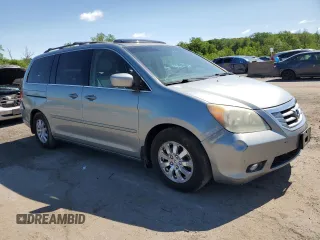 2010 Honda Odyssey EX-L с VIN 5FNRL3H75AB054835, выставлен на аукционе Copart как лот 56779865 с пробегом 121 546 миль миль и Чистый • Clean title. История ставок и продаж доступна на DreamBid. Изображение 4.