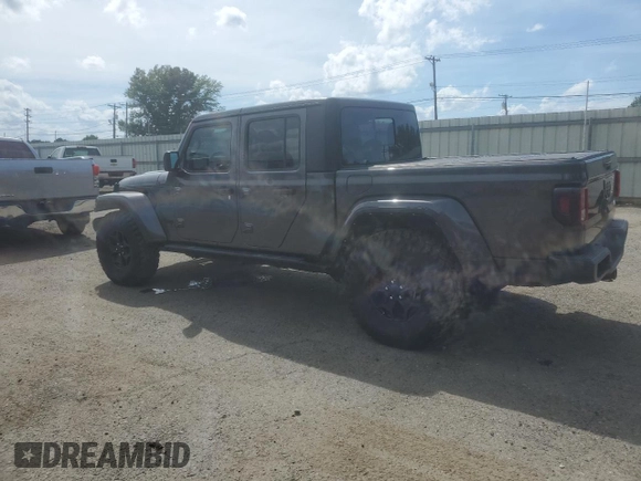 2021 Jeep Gladiator Willys with VIN 1C6HJTAG7ML572661, listed as a Copart auction lot 61172665 with 54,317 mi miles and Salvage title. Bid and sale history available at DreamBid. Image 2.