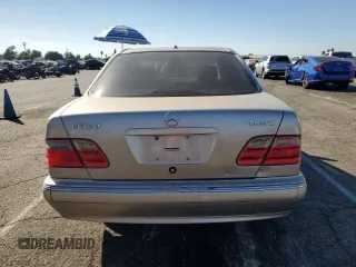 2000 Mercedes-Benz E-Class AWD with VIN WDBJF82G0YX029026, listed as a Copart auction lot 78106604 with 134,482 mi miles and Salvage Title. Bid and sale history available at carsss.com. Image 6.