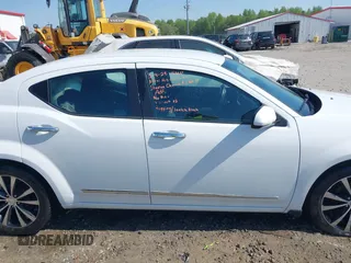 2013 Dodge Avenger SXT with VIN 1C3CDZCG2DN508594, listed as a IAAI auction lot 41771945 with 104,924 mi miles and . Bid and sale history available at DreamBid. Image 11.