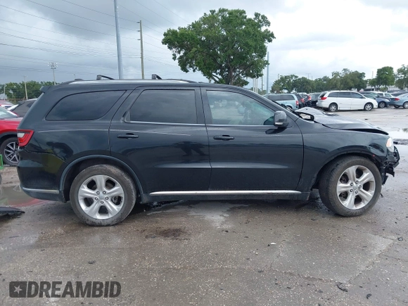 2014 Dodge Durango Limited with VIN 1C4RDHDG9EC593509, listed as a IAAI auction lot 42632996 with Not provided miles and . Bid and sale history available at DreamBid. Image 14.