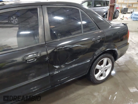 2003 Mazda Protege DX with VIN JM1BJ226431112902, listed as a IAAI auction lot 41939907 with 184,618 mi miles and . Bid and sale history available at DreamBid. Image 22.