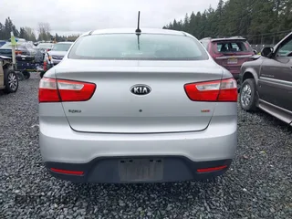 2014 Kia Rio LX with VIN KNADM4A31E6327403, listed as a IAAI auction lot 41915952 with 127,167 mi miles. Bid and sale history available at carsss.com. Image 16.