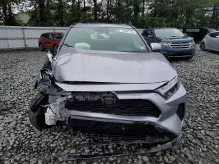 2023 Toyota RAV4 Hybrid SE with VIN JTM16RFV7PD100111, listed as a Copart auction lot 56682135 with 32,198 mi miles and Salvage title. Bid and sale history available at DreamBid. Image 5.