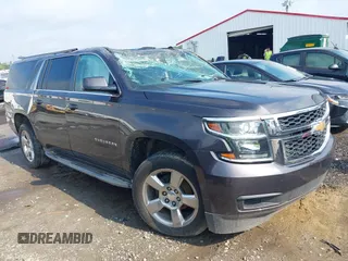 2015 Chevrolet Suburban LT z VIN 1GNSCJKC5FR265442, wystawiony jako IAAI lot #42274769 z przebiegiem 111 285 mil mil oraz . Historia ofert i sprzedaży dostępna na DreamBid. Obrazek 1.