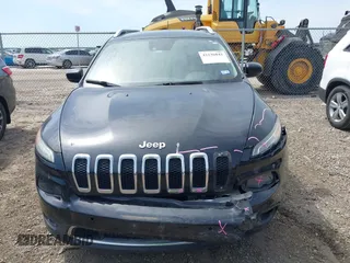 2014 Jeep Cherokee Limited with VIN 1C4PJLDB4EW256137, listed as a IAAI auction lot 42236043 with 145,517 mi miles and . Bid and sale history available at DreamBid. Image 13.