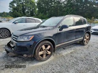2013 Volkswagen Touareg Lux with VIN WVGEF9BP6DD010352, listed as a Copart auction lot 62585305 with 210,935 mi miles and Salvage title. Bid and sale history available at DreamBid. Image 1.