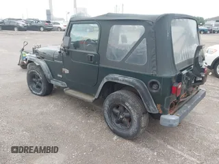 1999 Jeep Wrangler SE z VIN 1J4FY29P7XP479351, wystawiony jako IAAI lot #42797020 z przebiegiem 171 598 mil mil oraz . Historia ofert i sprzedaży dostępna na DreamBid. Obrazek 3.
